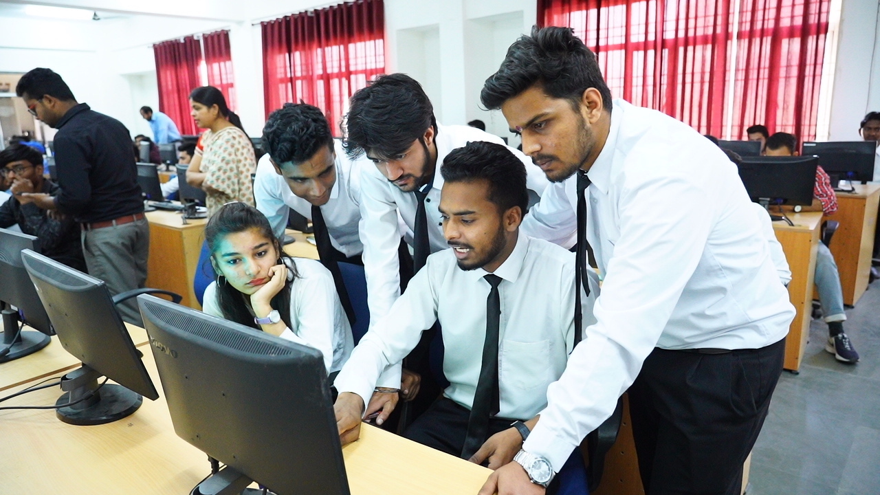 MCA students studying computer applications